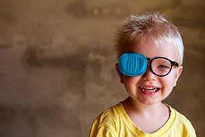 Child with an eye patch used to treat Amblyopia (Lazy Eye)